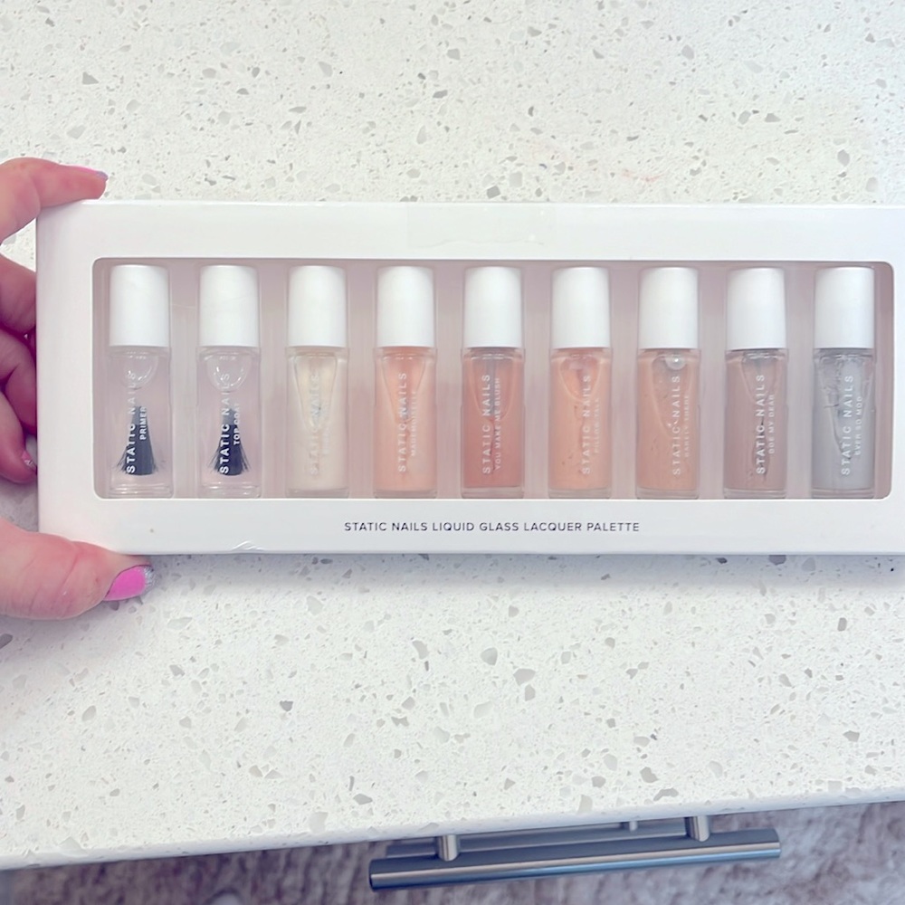 New In Box … 9 Different Nail Polishes - Clear, White, Light Pinks, to Gray